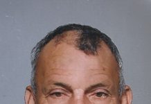 Lourens Werleman A picture containing person, person, wall, blue Description automatically generated