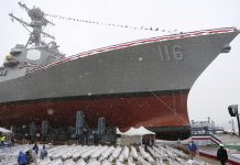 Merca mandando fighter jet y barco di guera den region di Golfo