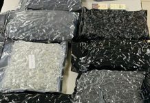 Dos homber deteni den un caso grandi di droga den area turistico