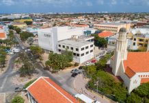 Gobierno di Aruba a inicia proceso oficial pa transforma ex-edificio di OM na Oranjestad den apartamento pa studiante