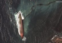 Gobierno di Aruba cla pa activa ekipo di 60 hende den caso cu derame di petroleo yega costa di Aruba