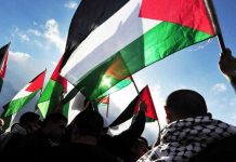 Polis a interveni den protesta pro-Palestino dilanti e embahada Israeli na Den Haag