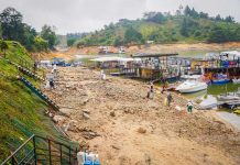 Guatape; paraiso Colombiano cu ta sufriendo e consecuencianan di secura