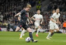 Man City cerca di gana titulo di Premier League cu Haaland anotando dos biaha den victoria riba Tottenham