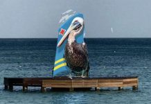 Palm Beach Tower Art Project ta bay tin un diseño di artista Paul Wong