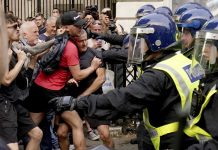 Polis Britanico ta prepara pa mas protesta ultra derechista mientras gobierno ta adverti di respuesta pisa