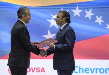 Merca ta rechasa reeleccion di Maduro, pero ta mantene un linea financiero pa su gobierno