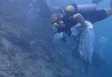 Buceado ta saca mas di shen kilo di desperdicio for di lama banda di Corsou