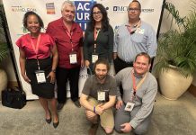 Ekipo di ANA a duna presentacionnan na conferencia di ACURIL