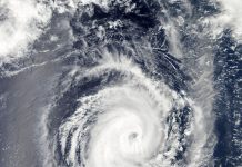 Cambio di clima ta acelerando y causando cambionan extremo den tempo; Moda di cambio di clima por pone seguridad di Aruba den peligro