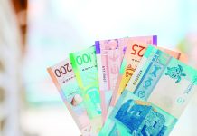 Segun encuesta di CBA: Mayoria ciudadano tin confiansa den cash a pesar di un aumento den pago digital FLORIN PLACA CASH MONEY