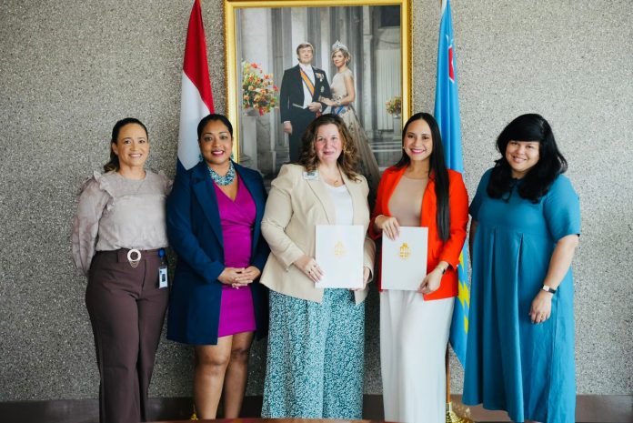 Minister di Educacion Gerlien Croes ta firma cu Husson University na Maine pa amplia oportunidadnan pa studiantenan Rubiano (1)