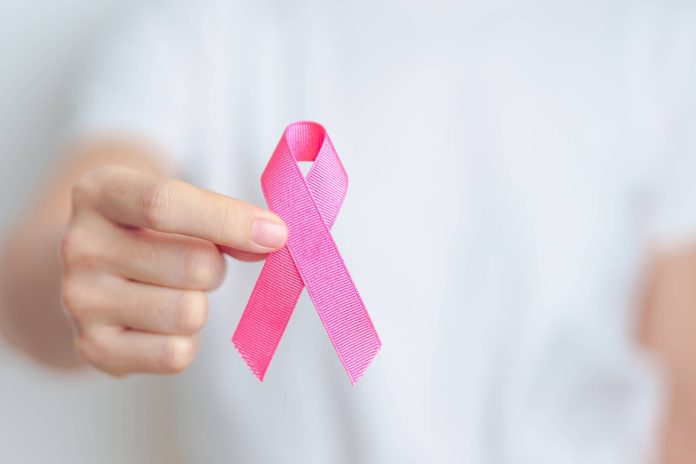 Pink,October,Breast,Cancer,Awareness,Month,,Woman,With,Pink,Ribbon