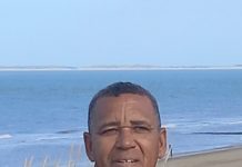 Anthony Giovanni Boyé A person standing on a beach AI-generated content may be incorrect.