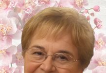 Maria Irena Croes-Schwengle A person wearing glasses and a pink shirt AI-generated content may be incorrect.