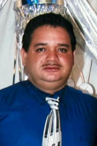 a-person-in-a-blue-shirt-and-tie-ai-generated-con A person in a blue shirt and tie AI-generated content may be incorrect.