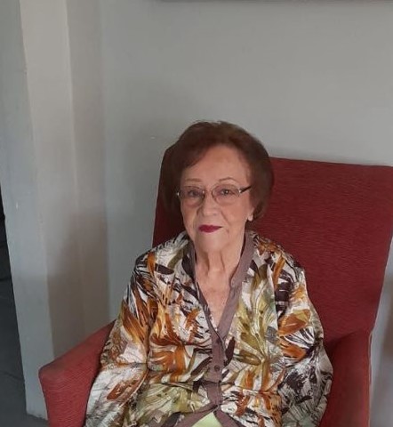 a-person-sitting-in-a-chair-ai-generated-content A person sitting in a chair AI-generated content may be incorrect.