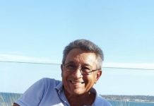 Jerry Robert Cerilo Arends A person sitting on a bench Description automatically generated