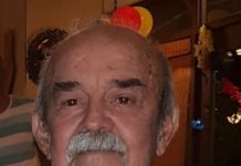 Narciso Zenobio Valdéz A person with a mustache and a plaid shirt AI-generated content may be incorrect.