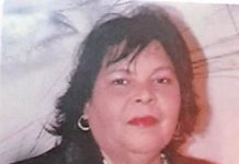 Melva Candelaria Ras Kelly A person with dark hair wearing a black jacket AI-generated content may be incorrect.