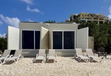 Anuncio di cabana priva riba Airbnb ta genera debate tocante acceso publico na beach
