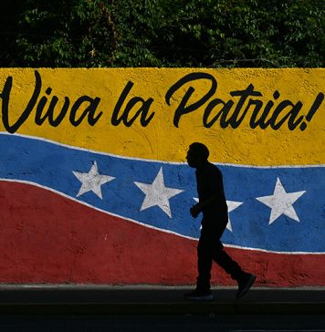 Impacto di Crisis di Venezuela riba Aruba su Turismo & Reserva Monetario