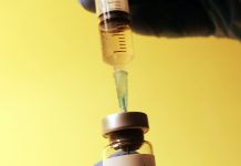 Perspectiva di pueblo riba vacuna di Covid-19 ta keda negativo