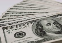 Dollar lo keda e moneda di reserva pa Aruba, pa awor; Oro ta keda un parti importante di reserva pa nos pais