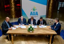 Gobierno ta firma MoU cu meta pa mehora proceso di biahe entre Aruba y Hulanda