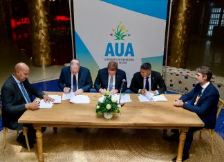 Gobierno ta firma MoU cu meta pa mehora proceso di biahe entre Aruba y Hulanda