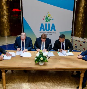 Gobierno ta firma MoU cu meta pa mehora proceso di biahe entre Aruba y Hulanda