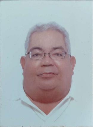 Pedro Daniel Kelly A person with glasses and a white shirt Description automatically generated