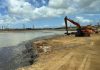Corsou ta busca financiamento internacional pa limpiesa di Buskabaai y pa transforma e area den hub maritimo industrial