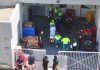 2 Trahado a bay haci warehouse limpi cu pressure washer di gasolin den warehouse cera