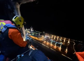 Wardacosta di Caribe Hulandes cu rescate di pasahero di crucero cu a haya atake